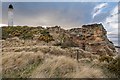 NJ2071 : Sandstone Cliff by Covesea Lighthouse by valenta