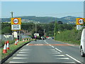 SO5275 : Rocks Green village sign on A4117 by Roy Hughes