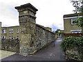 SP5507 : A stone pillar and wall on London Road by Steve Daniels