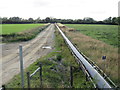 SU0795 : Conveyor belt near Cerney Wick by Malc McDonald