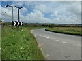 TA0771 : Chevrons at the bend, on the road north to Burton Fleming by Christine Johnstone