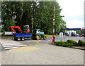 ST3486 : Kubota excavator in transit in Newport Retail Park by Jaggery