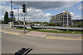 TL1997 : Construction site viewed from junction of London Road and Hawksbill Way by Phil Richards