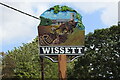 TM3679 : Wissett village sign (detail) by Adrian S Pye