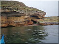 NJ1670 : Tunnel through sandstone at Clashach Cove by Nigel Feilden