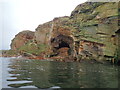 NJ1670 : A cave in the cliffs west of Covesea Quarry by Nigel Feilden