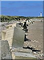 NJ2270 : Anti-tank blocks, Lossiemouth, Morayshire by Claire Pegrum