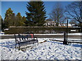 TF1505 : Bench and restored parish pump, Glinton, in the snow by Paul Bryan