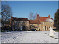 TF1606 : Peakirk village green in the snow by Paul Bryan