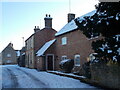 TF1606 : Chestnut Close, Peakirk, in the snow by Paul Bryan