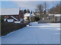 NT2441 : Snow-covered recreation field, Peebles by Jim Barton