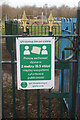 TA0831 : Covid 19 notice in Polish, Oak Road Playing Fields by Ian S