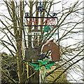 TM0060 : Shelland village sign by Adrian S Pye