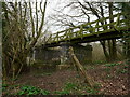 TG3127 : Piers of former railway bridge, now carrying a Weavers Way footbridge by David Pashley