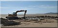 NX9255 : Digger on Mersehead Beach by Colin Kinnear