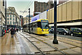 SJ8498 : Metrolink Tram on High Street by David Dixon