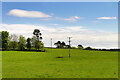 NU2322 : Telegraph Wires across a Field near to Embleton by David Dixon