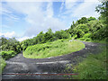 NN8249 : Hairpin bend at junction on hill road above Camserney by Trevor Littlewood