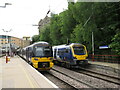 SE1633 : Trains at Bradford Forster Square by Malc McDonald