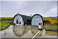 HY4800 : Two Huts outside the Italian Chapel by David Dixon