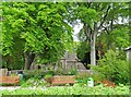 NZ1154 : Seats outside the churchyard by Robert Graham