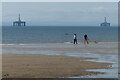 NO4002 : Dog walkers on the beach at Lundin Links by Mat Fascione