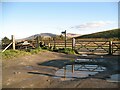 NY2825 : Gates and stile, Latrigg Car Park by Adrian Taylor