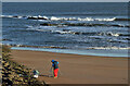 NU0248 : A sea angler at Cocklawburn Beach by Walter Baxter