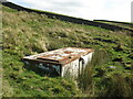 NZ0238 : Old cistern above Pit House by Mike Quinn