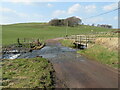 NT0640 : Candy Burn ford and footbridge by M J Richardson