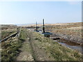 SD9916 : Sluices, Green Withens catchwater drain by Christine Johnstone