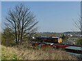 SE3333 : Freight train passing Wykebeck Avenue by Stephen Craven