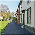 TM1877 : Housing along the green at Low Street, Hoxne by Roger Jones