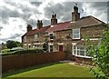 TA1045 : Terrace of cottages opposite Leven Primary School by Neil Theasby