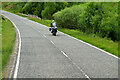 NH1011 : Motorcyclist on the A87 near Allt Choire a' Chait by David Dixon