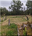 SO3504 : Rectangle of headstones in St David's churchyard, Trostrey by Jaggery