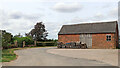 SJ8301 : Barn and farm road south of Kingswood, Staffordshire by Roger  D Kidd