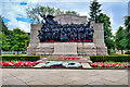 NZ2464 : War Memorial (The Response) by David Dixon