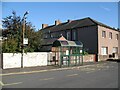 NY3853 : Bus stop, Cummersdale by Adrian Taylor