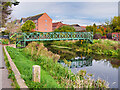 SK9770 : Footbridge across River Witham by David Dixon