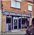 TQ5717 : Mane Cave Barbers, High Street by PAUL FARMER