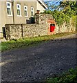 ST6593 : Red litter bin, Rockhampton, South Gloucestershire by Jaggery