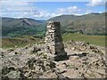 NY3405 : Triangulation Pillar, Loughrigg Fell by Adrian Taylor