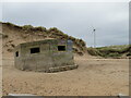 NJ9510 : Pillbox and wind turbine near Bridge of Don, Aberdeen by Malc McDonald