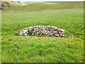 SK1064 : Water trough in a field by Ian Calderwood