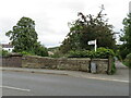 SJ3058 : Stone wall by Hope railway bridge, Fagl Lane by John S Turner