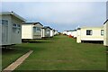 NZ3086 : Lines of caravans, Sandy Bay Caravan Park by Graham Robson