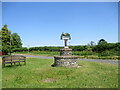 TL7799 : Village  name  sign  at  road  junction.  (2)  Foulden by Martin Dawes