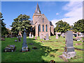 NH7989 : Dornoch Cathedral and Graveyard by David Dixon