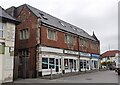 SE3038 : Shops with flats above on Grosvenor House at Harrogate Road / Street Lane junction by Roger Templeman